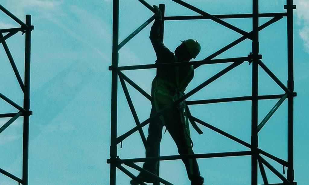 person on scaffolding